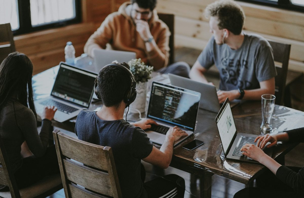 A small team working together on laptops
